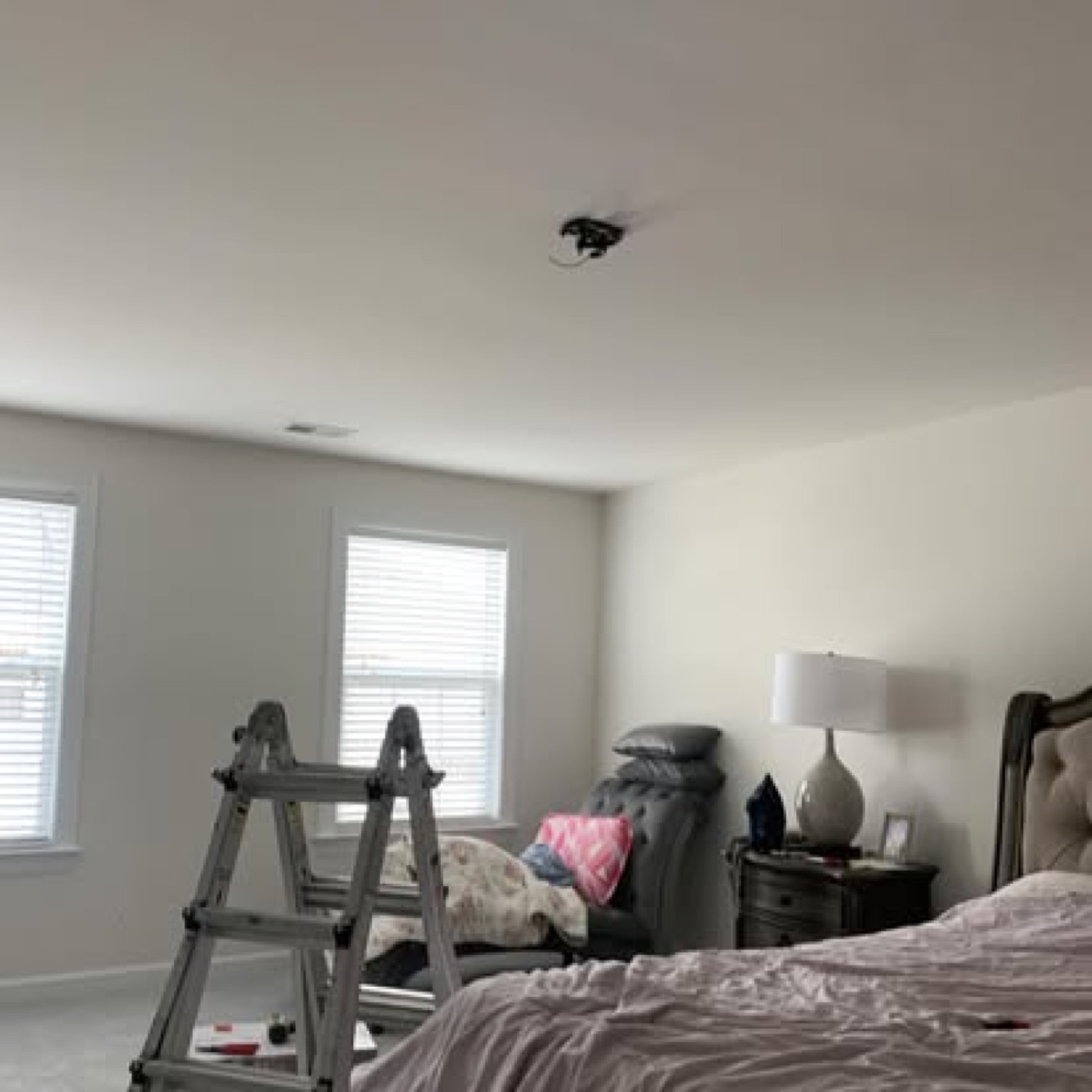 Bare ceiling wiring box before the fan installation
