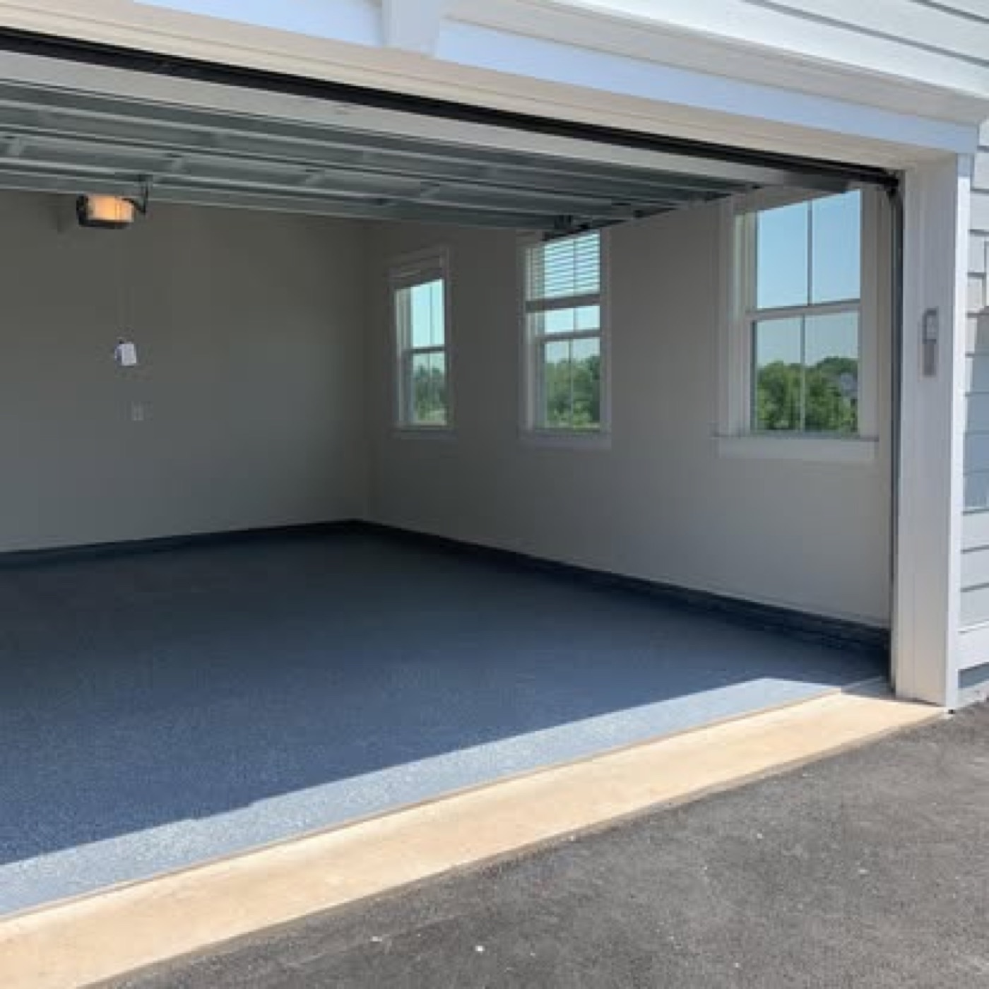 Garage with blue flake epoxy floor finish
